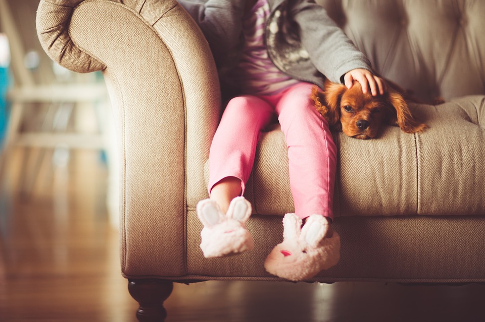 kid sitting on a couche